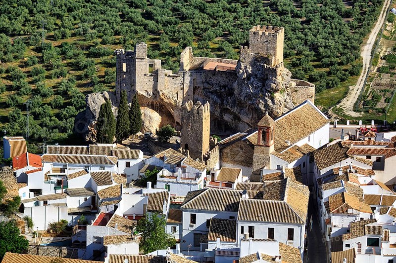 Whitewashed houses, view from above of Moorish-style castle, Route of the White Villages, Zuheros, UNESCO Geopark, Sierras Subbeticas Natural Park, Province of Cordoba, Cordoba, Andalusia, Spain, Europe