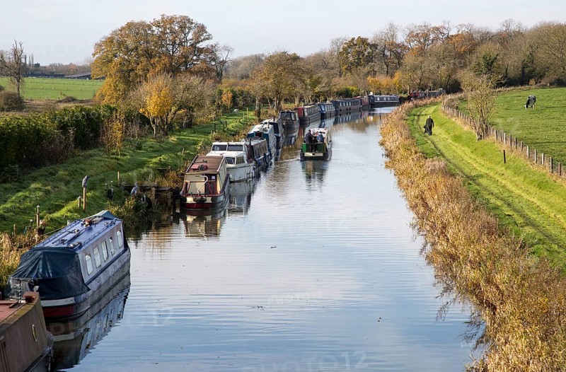 Narrowboats on Kennet and Avon canal, from Ladies bridge, Wilcot, near Woodborough, Wiltshire, England, UK