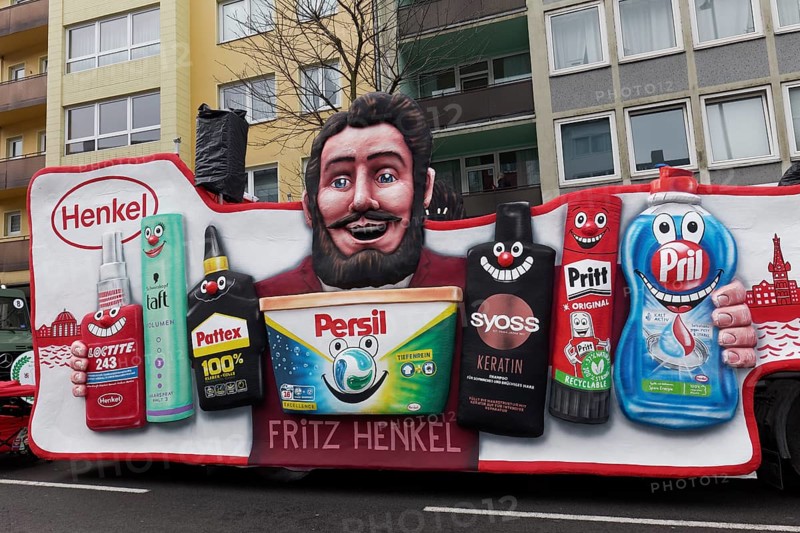Company founder Fritz Henkel presents Henkel Group products, Persil, Pattex, Pritt, Pril, Syoss, papier-mâché figure, themed float at the Rose Monday parade, Düsseldorf, North Rhine-Westphalia, Germany, Europe