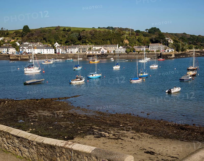 Yachts at moorings on River Fal, Flushing, Cornwall, England, UK