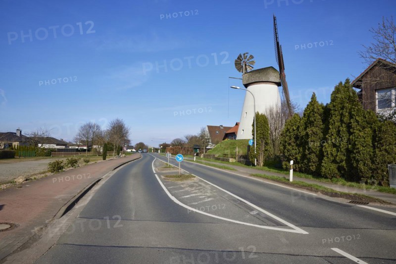 Windmill Hummelbecker Mühle under a cloudless blue sky, a Wall-Holländer, is part of the Westphalian Mill Road in Dützen, Minden, Mühlenkreis Minden-Lübbecke, North Rhine-Westphalia, Germany, Europe