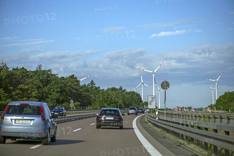 Wind turbines on the A 9 motorway, cloudy sky, Brandenburg, Germany, Europe