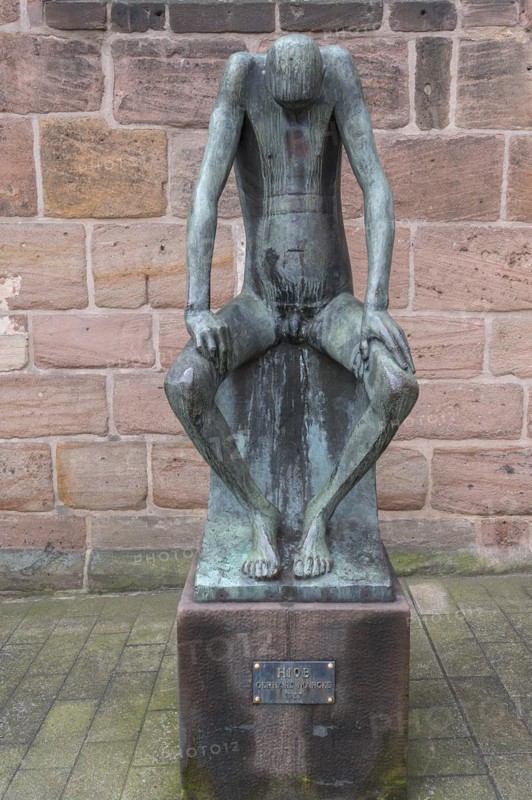 Bronze sculpture of Job, created by the German sculptor Gerhard Marcks in 1957, in front of St Clare's Church, Königstraße 66, Nuremberg, Middle Franconia, Bavaria, Germany, Europe
