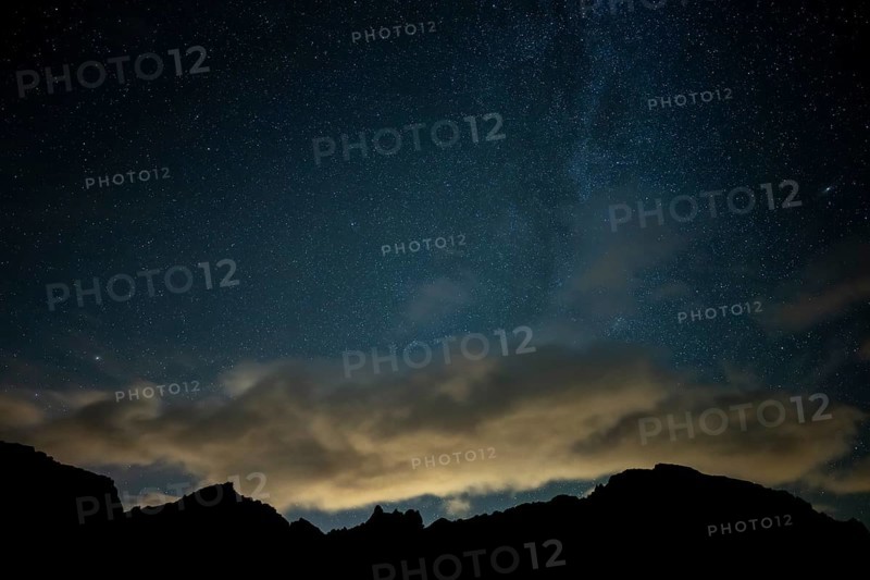 Milky Way and starry sky with Montafon mountains, Tschagguns, Rätikon, Montafon, Vorarlberg, Austria, Europe