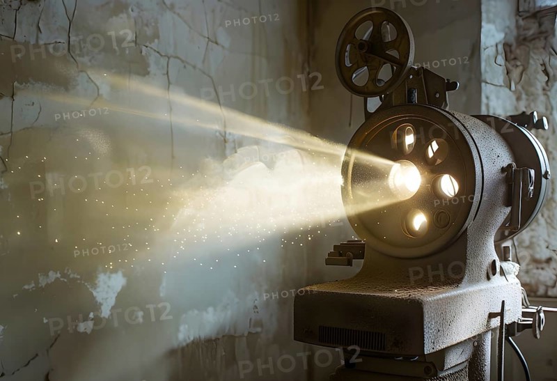 An old movie projector casting flickering images onto a cracked wall, creating a sense of vintage cinema and nostalgia, AI generated