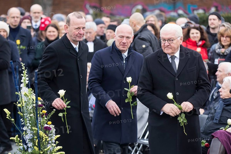 Axel Klausmeier (Director of the Berlin Wall Foundation), Kai Wegner (Governing Mayor of Berlin) and Frank-Walter Steinmeier (President of the Federal Republic of Germany) with roses in their hands at the central commemorative event at the Berlin Wall Memorial to mark the 35th anniversary of the fall of the Wall in Berlin, 9 November 2024
