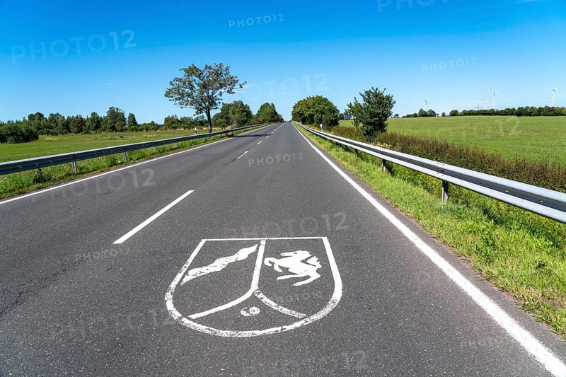 Federal road B265, state border south of the town of Kehr, between North Rhine-Westphalia and Rhineland-Palatinate, North Rhine-Westphalia Coat of arms on the carriageway, Germany, Europe