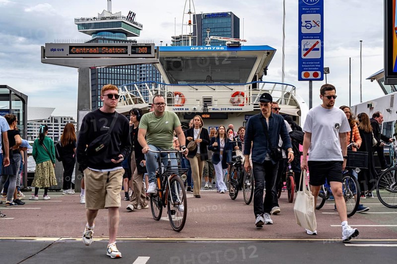 GVB ferries for pedestrians and cyclists across the river Ij, at Amsterdam Centraal station, free of charge, to the eastern parts of the city, Netherlands