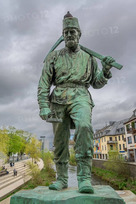 Sculpture of a smelter man from the former Siegen hammer mill, created in 1902 by Prof. Dr Friedrich Reusch, Siegen, North Rhine-Westphalia, Germany, Europe