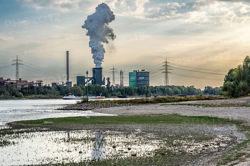 HKM Huckingen steelworks, coking plant, cargo ship on the Rhine, at extremely low water, Duisburg, North Rhine-Westphalia, Germany, Europe