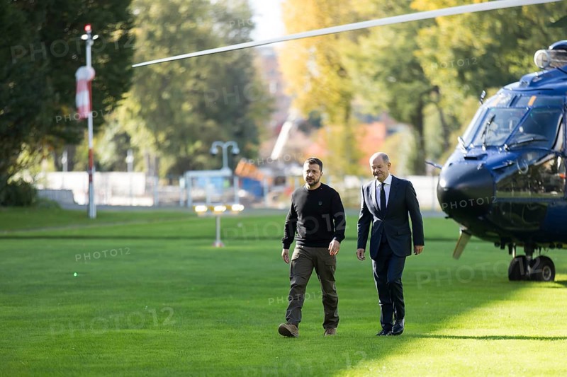Volodymyr Zelensky (President of Ukraine) is received by Olaf Scholz (Chancellor of the Federal Republic of Germany) after his arrival by helicopter in front of the Federal Chancellery, 11 October 2024
