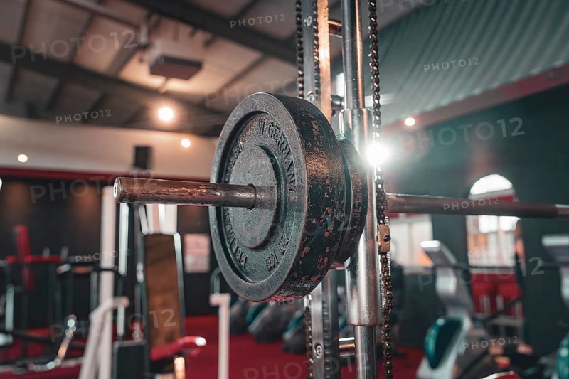 Dumbbell bar with weight in the centre of a fitness room, Historic Fitness Studio, Bulls Fit, Mannheim, Germany, Europe