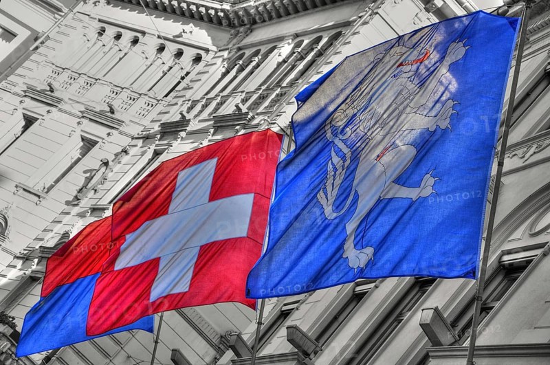 City Hall with Ticino Flag and Swiss Flags and Locarno Flag in City of Locarno, Ticino, Switzerland, Europe