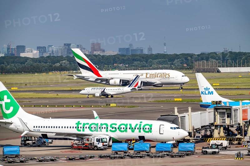 Amsterdam Schiphol Airport, Emirates Airbus A380 taking off on the Aalsmeerbaan runway, aircraft on the taxiway, at the terminal, Gate D, check-in, apron, Amsterdam, Netherlands