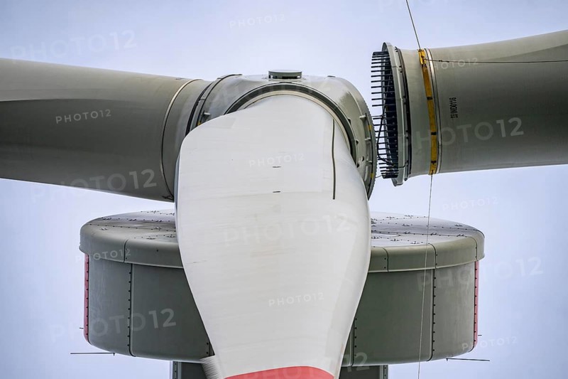 Erection of a wind turbine, wind energy plant, assembly of the third blade, with a crawler lattice crane, wind farm near Hagen, North Rhine-Westphalia, Germany, Europe