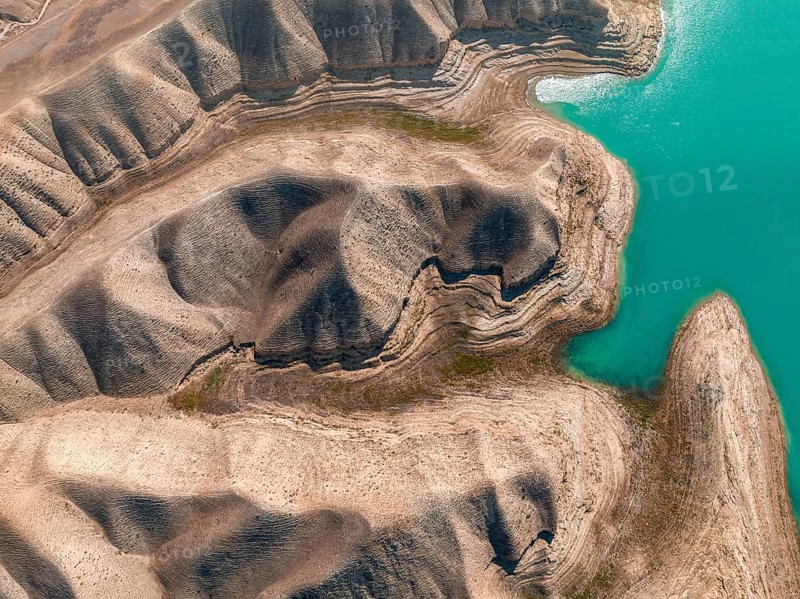 Top-Down, Barren landscape, Aerial view, Erosion landscape with canyons at the river Naryn, Toktogul reservoir, Kyrgyzstan, Asia