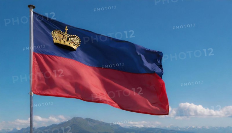 The flag of Liechtenstein flutters in the wind