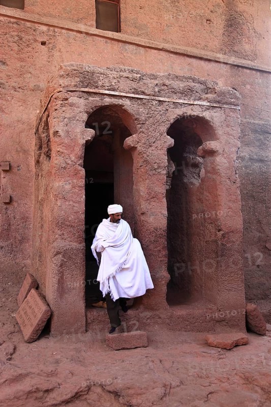 Rock churches of Lalibela, entrance to St Mary's Church and pilgrims, Bete Maryam, Ethiopia, Africa