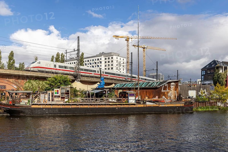 Holzmarkt 25, urban neighbourhood in Berlin-Friedrichshain. Internationally recognised example of user-driven urban development. Park with a popular view of the riverside, unconventional bars and food stalls. Cityscape Berlin, Germany, Europe