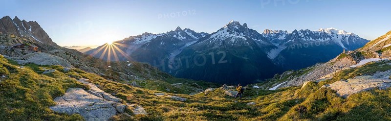 Panorama, morning atmosphere with sun star, Mountain landscape at sunrise, Mountain hut Refuge du Lac Blanc, Mountain peak, Aiguille Verte, Grandes Jorasses, Aiguille du Moine, Mont Blanc, Mont Blanc massif, Chamonix-Mont-Blanc, Haute-Savoie, France, Europe