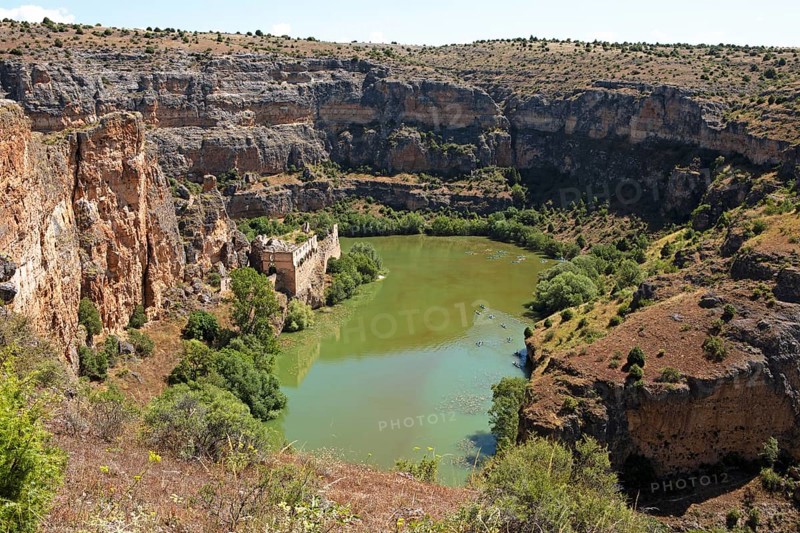 Canoes in the gorge on the Duratón river, on the left the Franciscan monastery of La Hoz, Hoces del Rio Duratón nature park Park, Segovia province, Castile and Leon, Spain, Europe