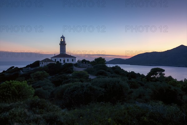 Lighthouse on a hill at sunset with a view of the sea and the surrounding area, Lastovo, Neretva, Croatia, Europe