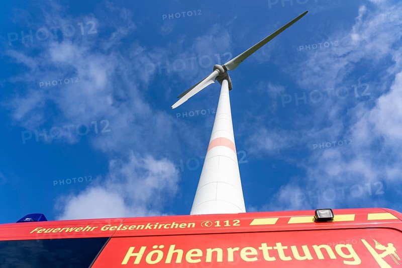 Height rescuers from the Gelsenkirchen fire brigade practise abseiling from a wind turbine from a height of 110 metres after rescuing an accident victim from the nacelle, Gladbeck, North Rhine-Westphalia, Germany, Europe