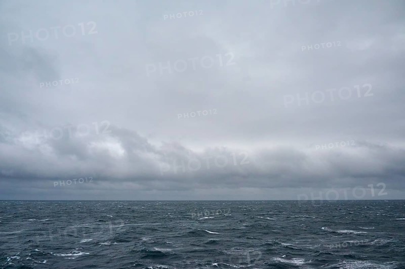 A stormy and turbulent sea under a cloudy grey sky, North Sea, Norway, Europe
