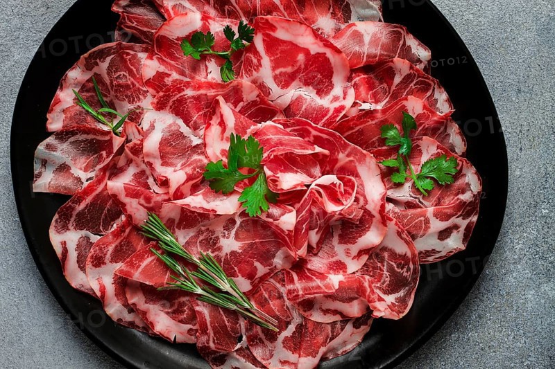 Sliced cured ham, prosciutto, italian dish, delicacy, parma ham, top view, no people
