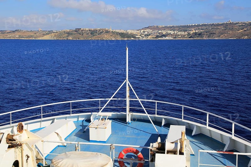 Bow of Gozo Channel Line ferry ship approaching Mgarr, Gozo, Malta, Europe