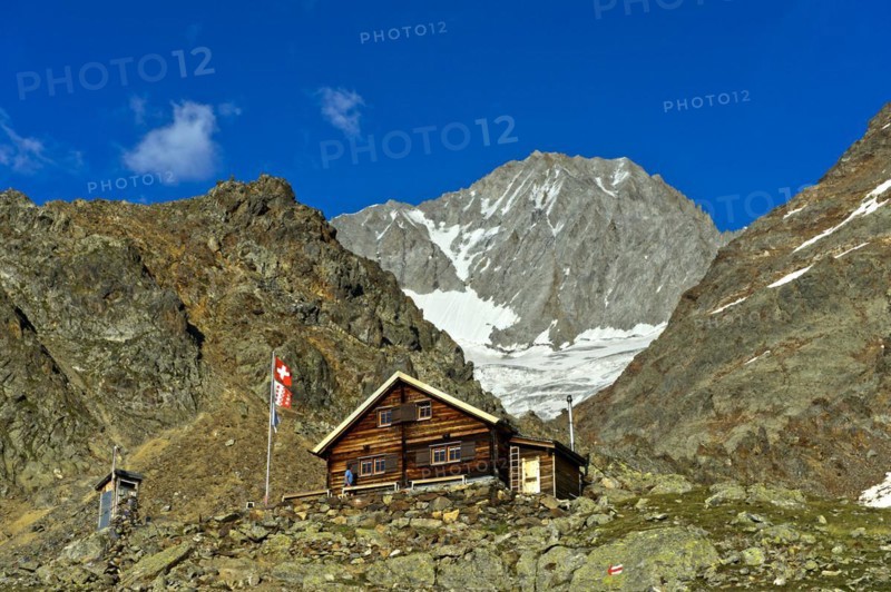 Bietschhorn hut of the Academic Alpine Club of Bern AACB, Bietschhorn summit at the rear, Lötschental, Valais, Switzerland, Europe