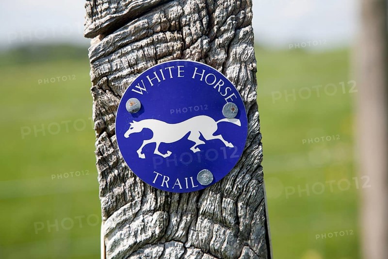Close up of way marker sign for the White Horse Trail in Wiltshire, England, UK. The White Horse Trail is a 90 mile walk taking in all 8 existing white horses cut into the Wiltshire hills
