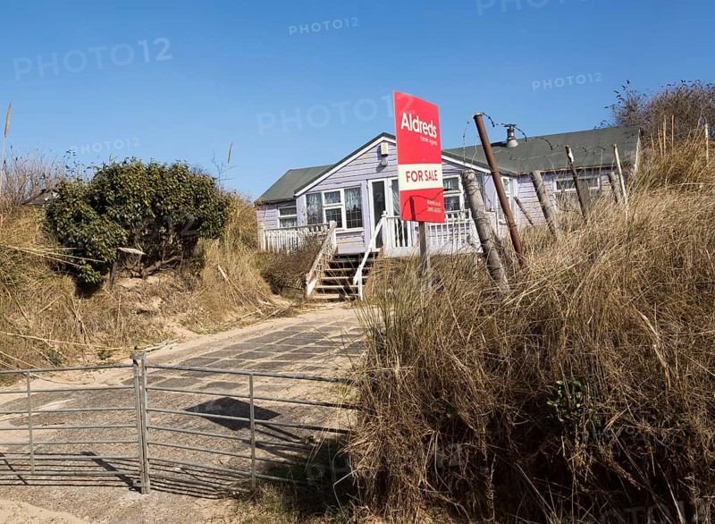 March 2018, Clifftop property collapsing due to coastal erosion after recent storm force winds, Hemsby, Norfolk, England, UK