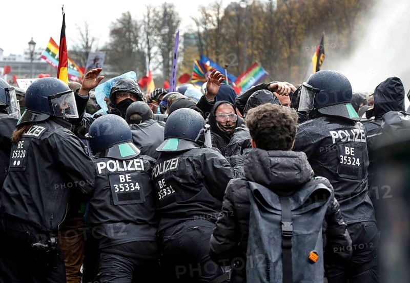 Water cannon in use at the Brandenburg Gate. Once again, thousands of corona deniers are demonstrating against the restrictions in the pandemic. The police broke up the demonstration for not observing social distancing rules and not wearing face masks, Berlin, 18 November 2020