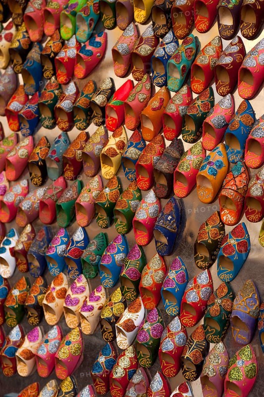 Small babouche magnets on a market, shoes, painted, trade, market, trader, bazaar, offer, colourful, handicraft, Islam, souk, medina, product presentation, display, trade, tourism, Sovenian, travel, African, Arabic, Essaouira, Morocco, Africa
