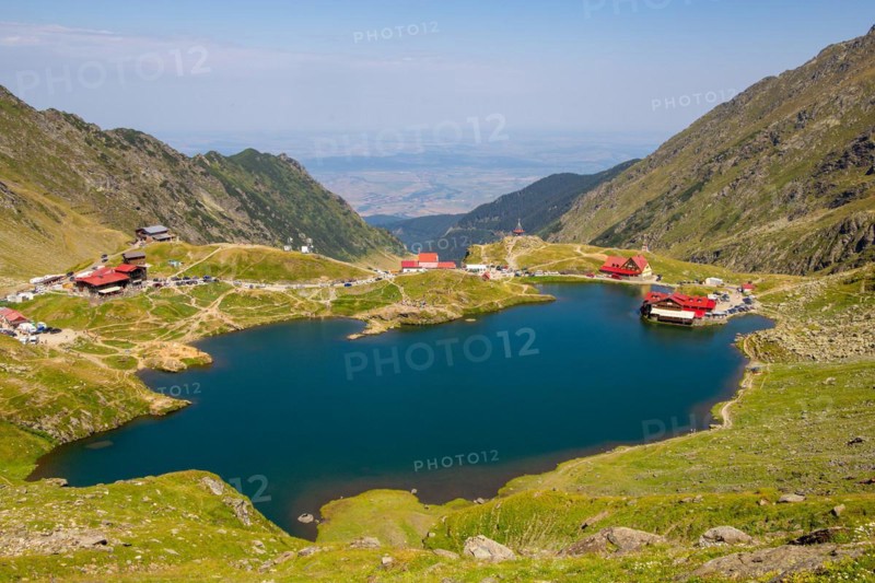 Romania: Lake Balea (Romanian: Balea Lac) from above. The lake is located at the summit of the Transfogarasch High Road in the Fogarasch Mountains on the border between Transylvania and Wallachia and is a popular excursion destination