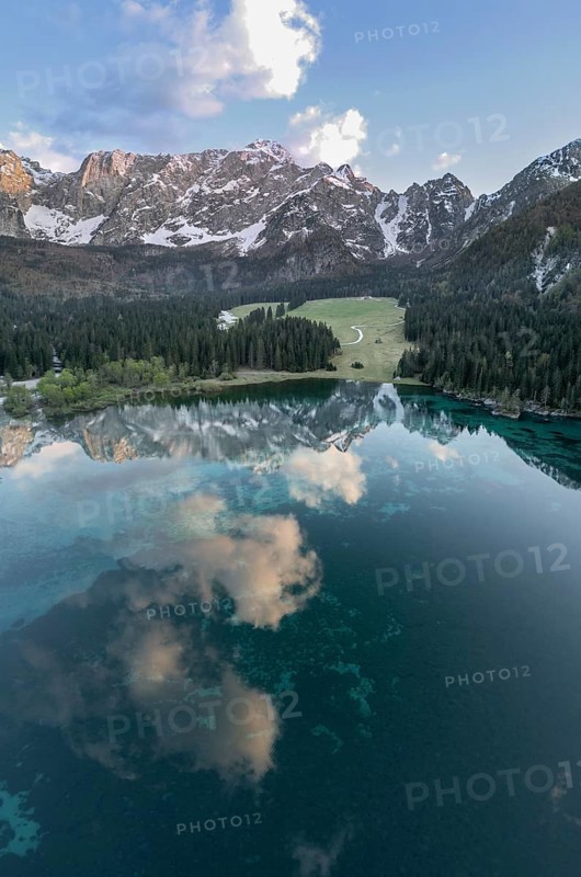 Aerial view of Lago Fusine with the Mangart massif in the background, Tarvisio, province of Udine, Italy, Europe