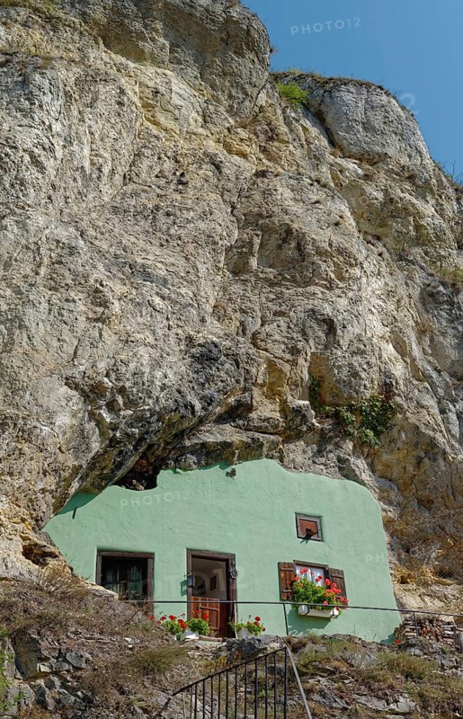 Unique green house without roof embedded in a limestone rock face with floral decoration, Kallmünz, Upper Palatinate, Bavaria, Germany, Europe