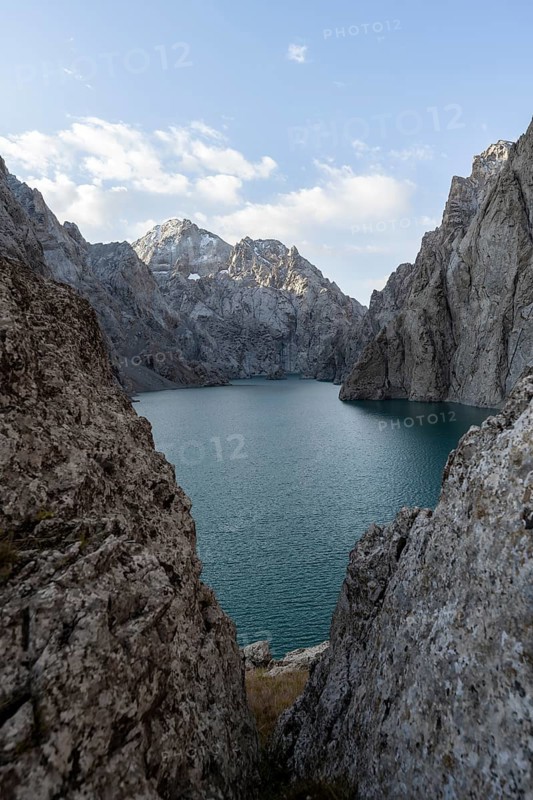 Mountain lake Kol Suu rocky steep mountains, Kol Suu Lake, Sary Beles Mountains, Naryn Province, Kyrgyzstan, Asia