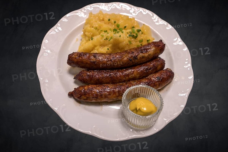 Three Franconian sausages with Sinapis on a dark background, Franconia, Bavaria, Germany, Europe