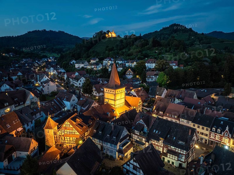 The old town of Gengenbach at the blue hour, with the Haigeracher Tor, town gate, and the Jakobuskapelle, mountain chapel on a vineyard, sights and landmarks of Gengenbach, aerial view, night view, Ortenaukreis, Baden-Württemberg, Germany, Europe