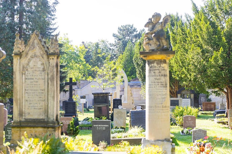 A new monument can be seen at Caspar David Friedrich's grave in Dresden's Trinitatisfriedhof cemetery to mark the 250th birthday of the most famous Romantic artist. The Gothic church window made of sandstone with an owl in rear view on the ledge. The construction was supported by the actor and Friedrich admirer Tom Pauls, Grave of Caspar David Friedrich, Dresden, Saxony, Germany, Europe