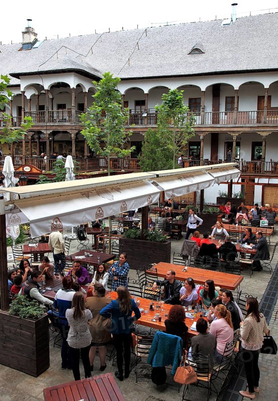 Bucharest, city centre, building, courtyard of the Hanul lui Manuc now houses restaurants, former caravanserai, wooden arcades, Romania, Europe