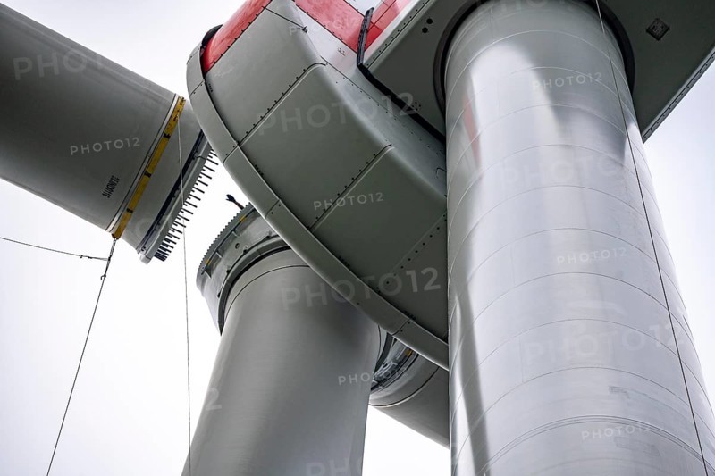 Erection of a wind turbine, wind energy plant, assembly of the third blade, with a crawler lattice crane, wind farm near Hagen, North Rhine-Westphalia, Germany, Europe