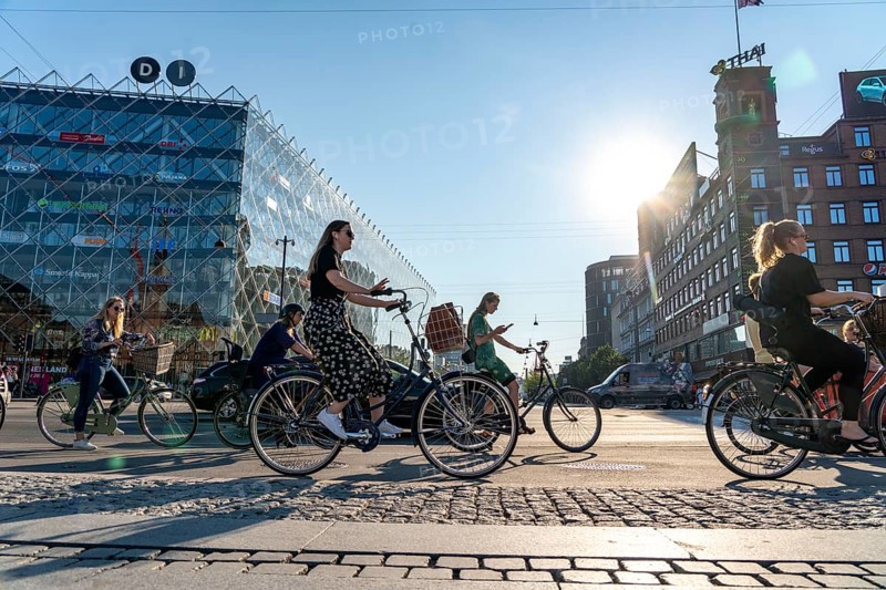 Cyclists on cycle paths, Radhuspladsen, City Hall Square, H.C. Andersen's Boulevard, in the city centre of Copenhagen, considered the cycling capital of the world, 45% of the population travel by bike, Denmark, Europe