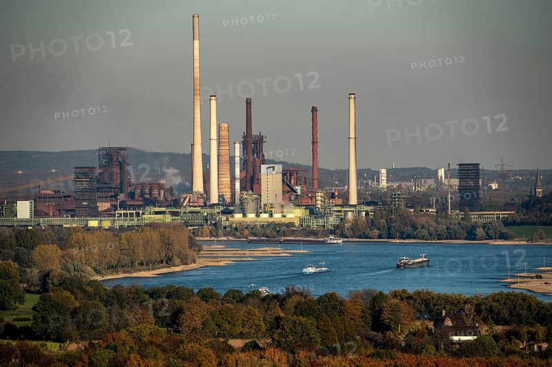 Rhine at Duisburg Bruckhausen, Thyssenkrupp Steel steelworks, blast furnaces, sintering plant, Schwelgern coking plant, cargo ships, North Rhine-Westphalia, Germany, Europe