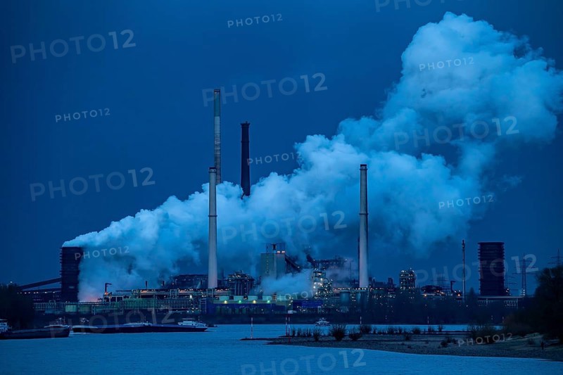 Rhine at Duisburg Bruckhausen, Marxloh, Thyssenkrupp Steel steelworks, blast furnaces, sintering plant, discharge cloud of the Schwelgern coking plant, cargo ships, Duisburg, North Rhine-Westphalia, Germany, Europe