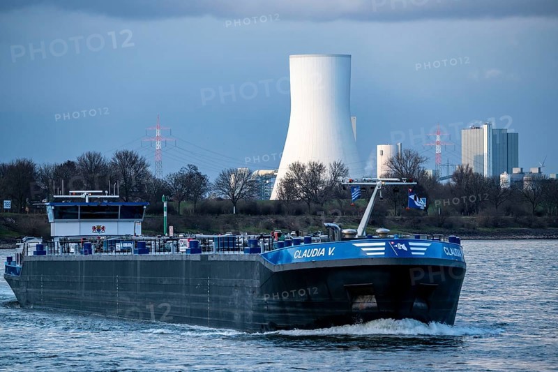Cooling tower of the Duisburg-Walsum coal-fired power plant, on the Rhine, operated by STEAG and EVN AG, 181 metres high, power plant unit 10, Duisburg, cargo ship, North Rhine-Westphalia, Germany, Europe