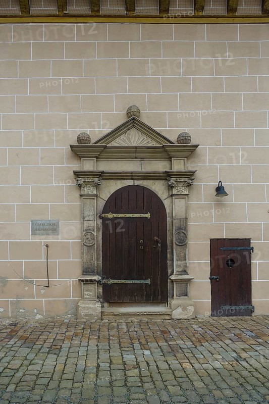 Entrance Protestant castle church, gate, wooden door, information board, writing, letters, masonry, Hohentübingen Castle, Museum of the University of Tübingen MUT, higher education institution, historical building, place of learning, Renaissance complex built in the 16th century, in the castle courtyard, Eberhard Karls University of Tübingen, Tübingen, Baden-Württemberg, Germany, Europe
