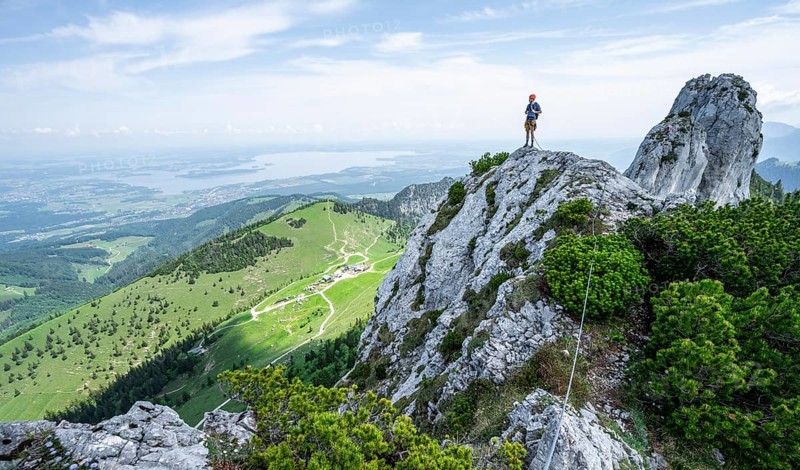 Climber on a climbing tour, climber on a mountain ridge, alpine climbing, crossing the Kampenwand, Chiemgau, Bavaria, Germany, Europe